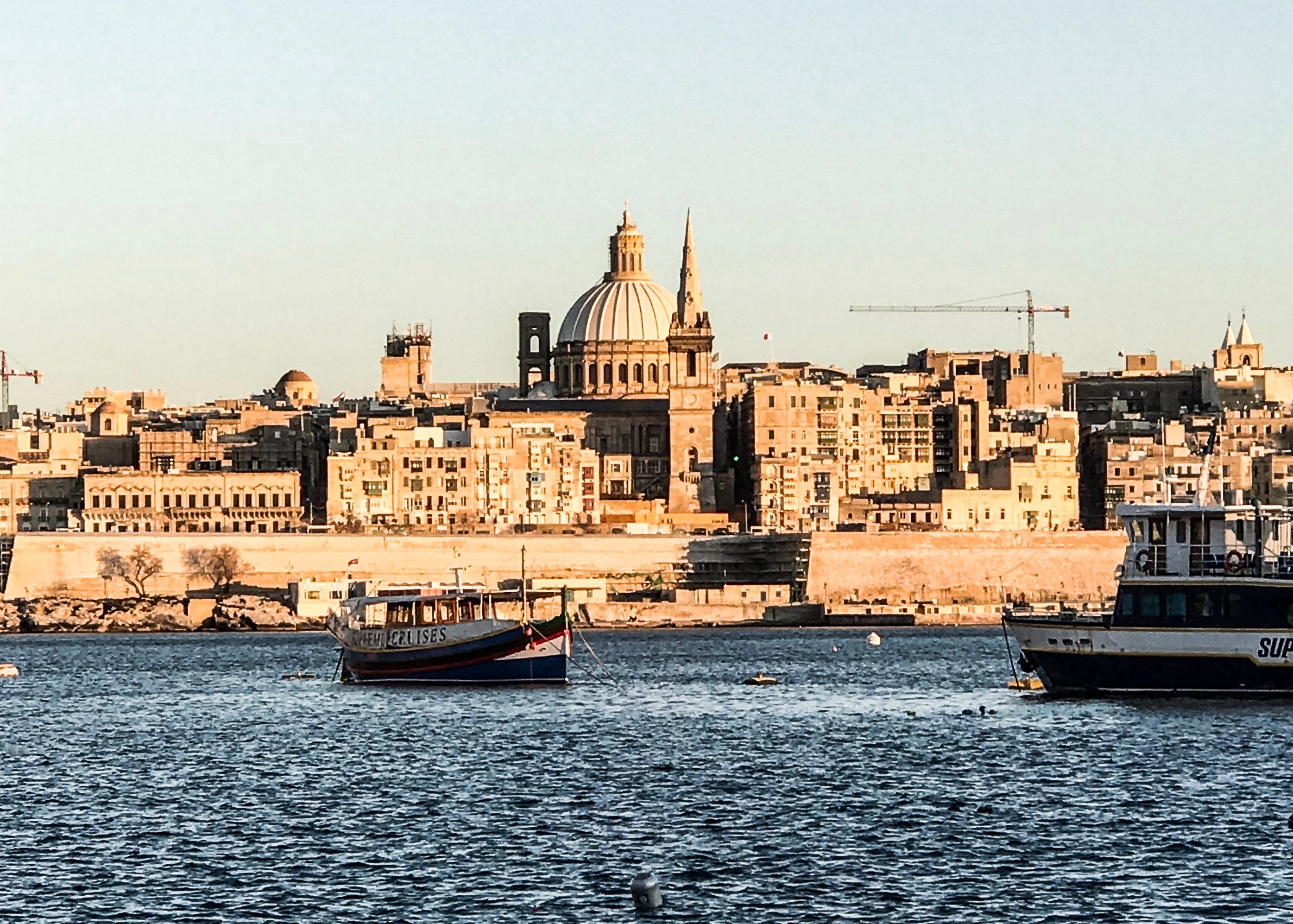 Valletta, Malta. Photo by Ines Bahr from Pexels https://www.pexels.com/photo/two-ship-on-body-of-water-near-buildings-2098179/