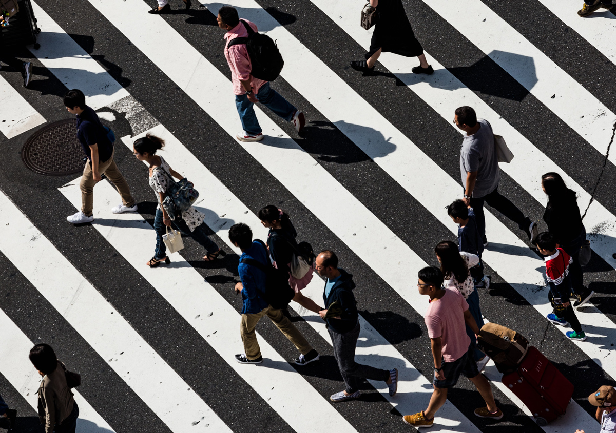 People in motion. Photo by Ryoji Iwata on Unsplash.